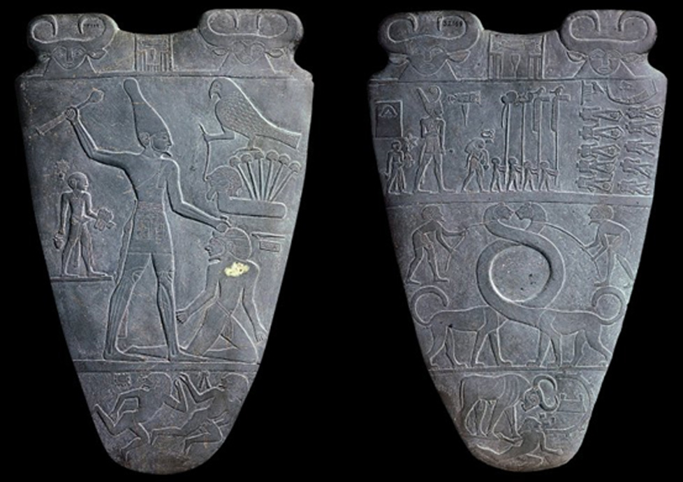 La Paleta de Narmer nos muestra a un rey gigante derrotando a sus enemigos. c. 3100 a. C. (Dominio público)