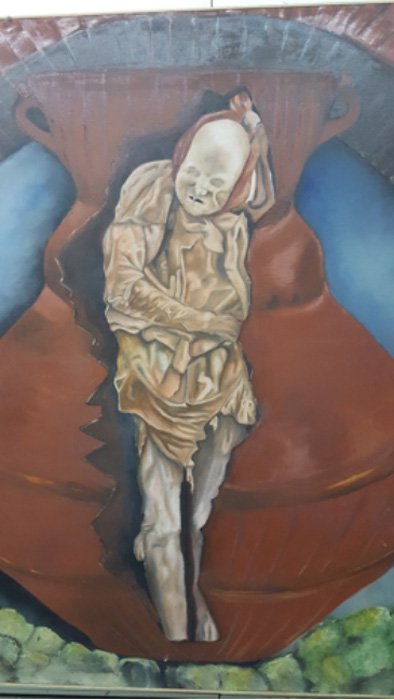 Pintura mural: la momia de Fray Lázaro dentro del cántaro en el que el franciscano fue enterrado. Fotografía: Chris Aguilar