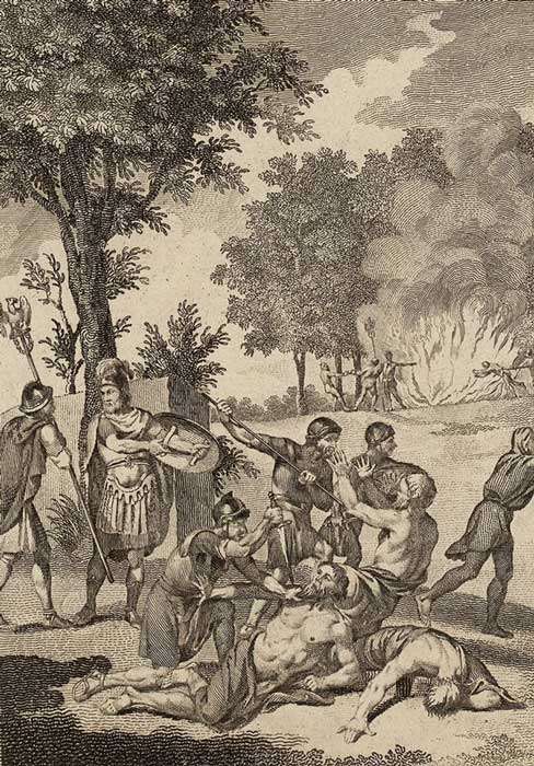 Soldados romanos asesinan druidas y queman sus arboledas sagradas en Anglesey, como narra Tácito en sus Anales. (Public Domain)