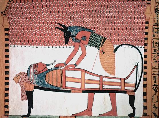 Anubis, el dios con cabeza de chacal cuidando de la momia del fallecido. 